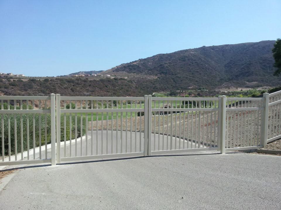 Vinyl picket and rail fence with mountain view